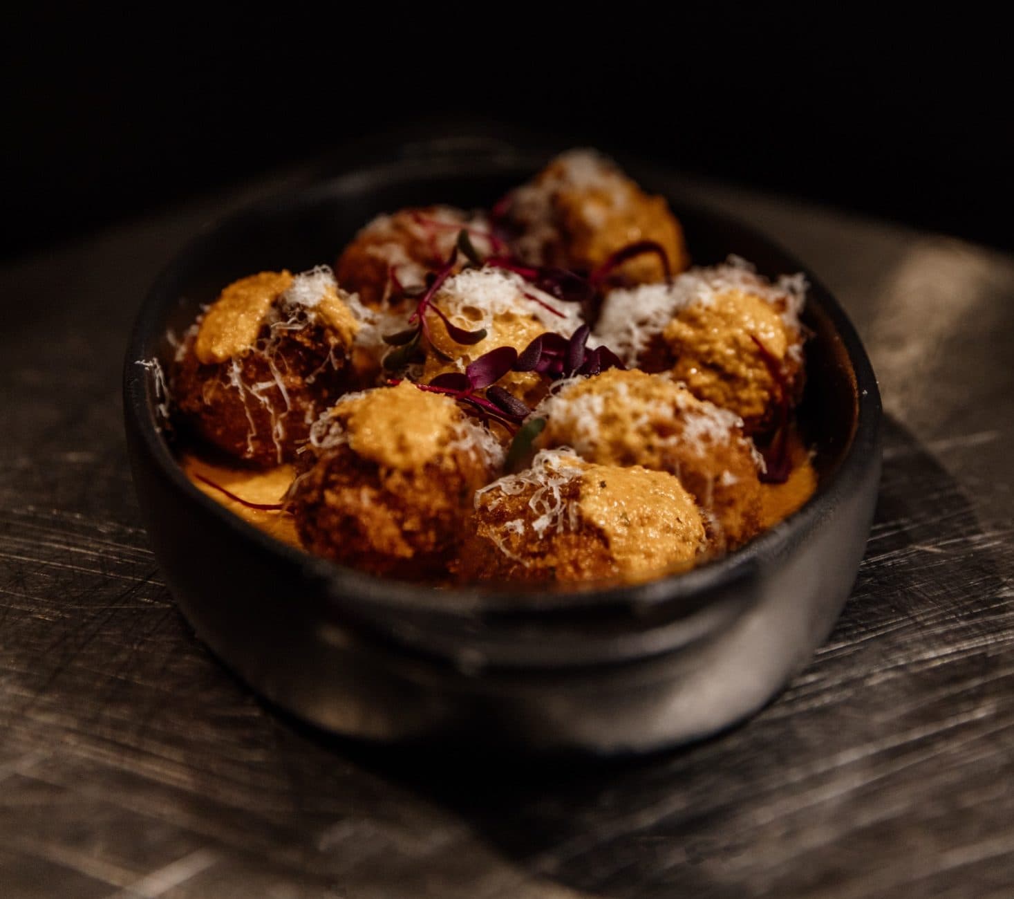 Blue crab arancini with pecorino risotto at CHR Steak