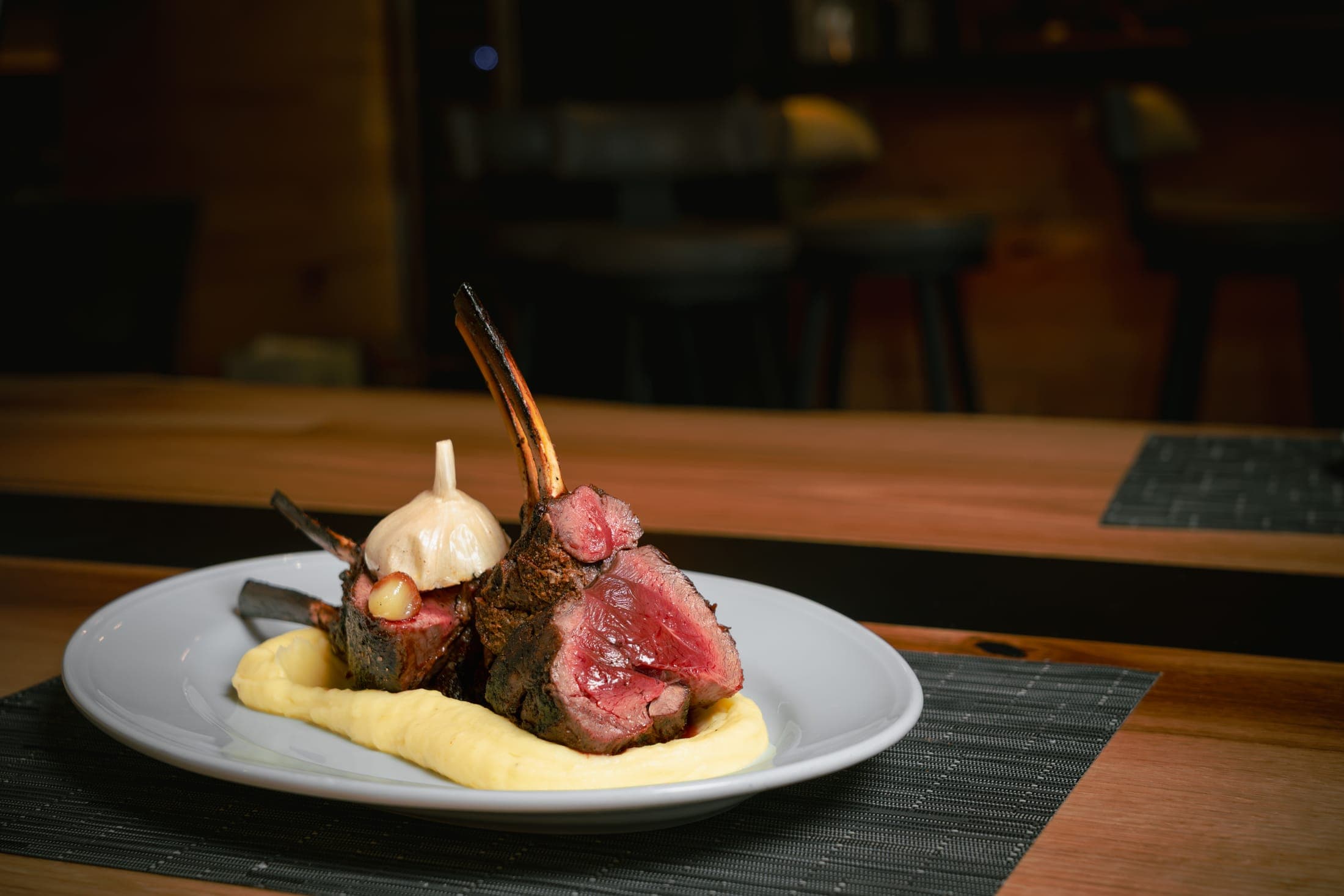 Bone-in elk rack from the wild game section of the CHR Steak menu