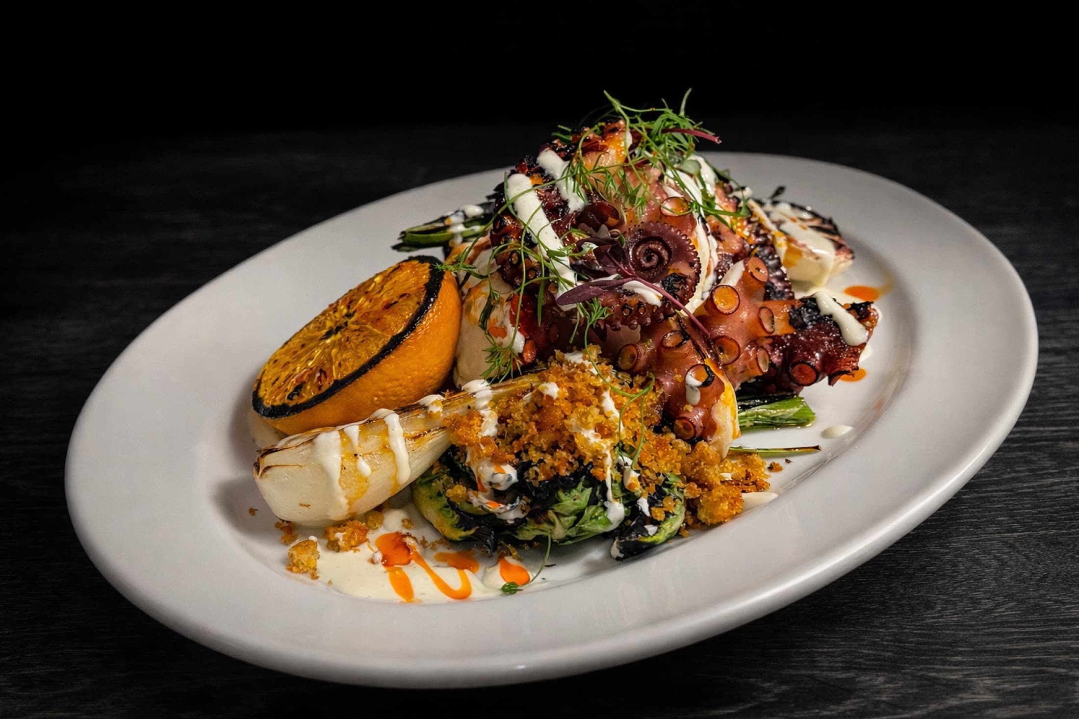 Charred octopus with citrus gremolata, pistachios, and blood orange