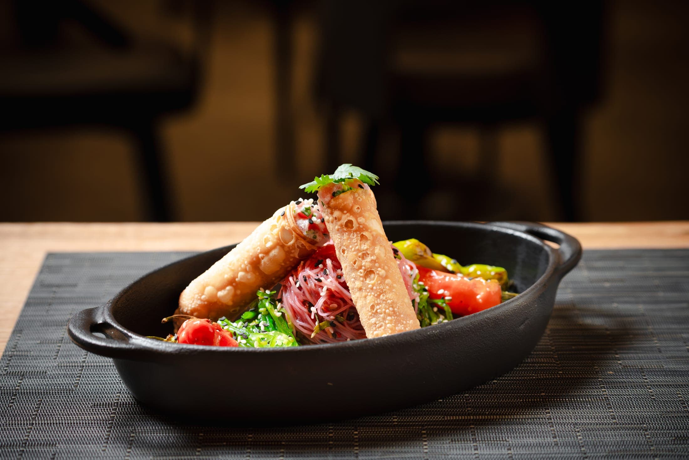 Tuna cannoli served in a cast iron dish at CHR Steak