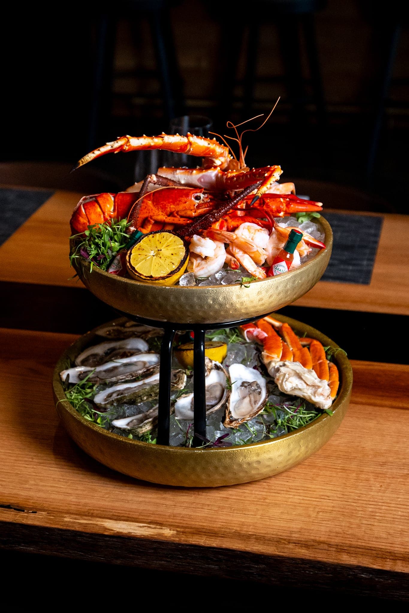 Chilled seafood tower with oysters, shrimp, crab, and lobster at CHR Steak