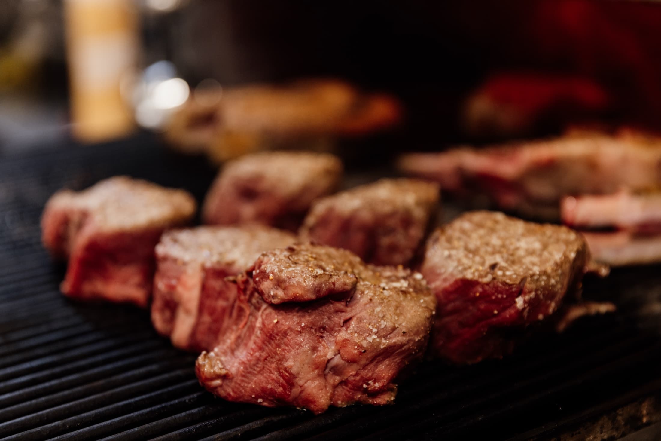 Sliced grilled steak served at CHR Steak